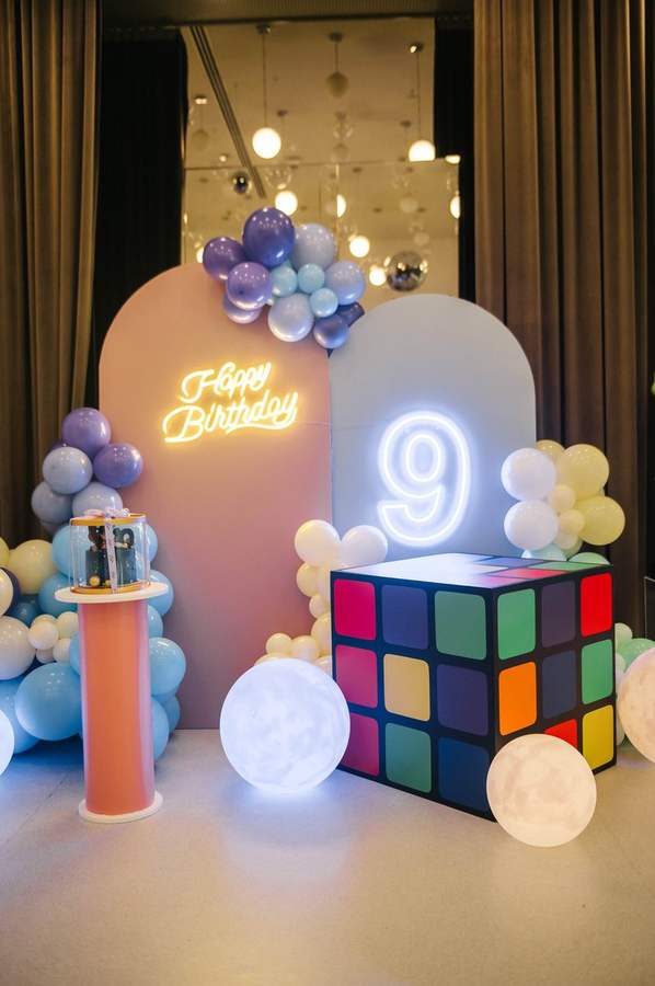 Neon Happy Birthday backdrop with balloons